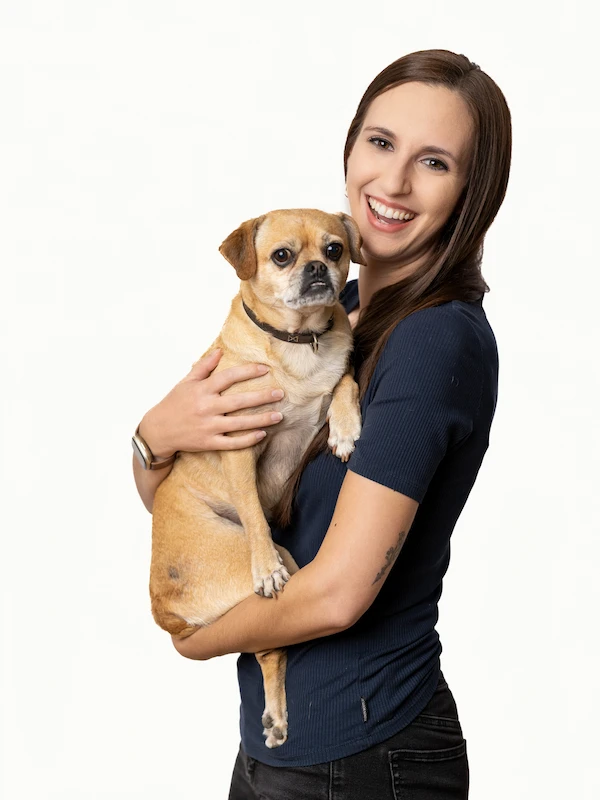 Julia Prince holding her dog